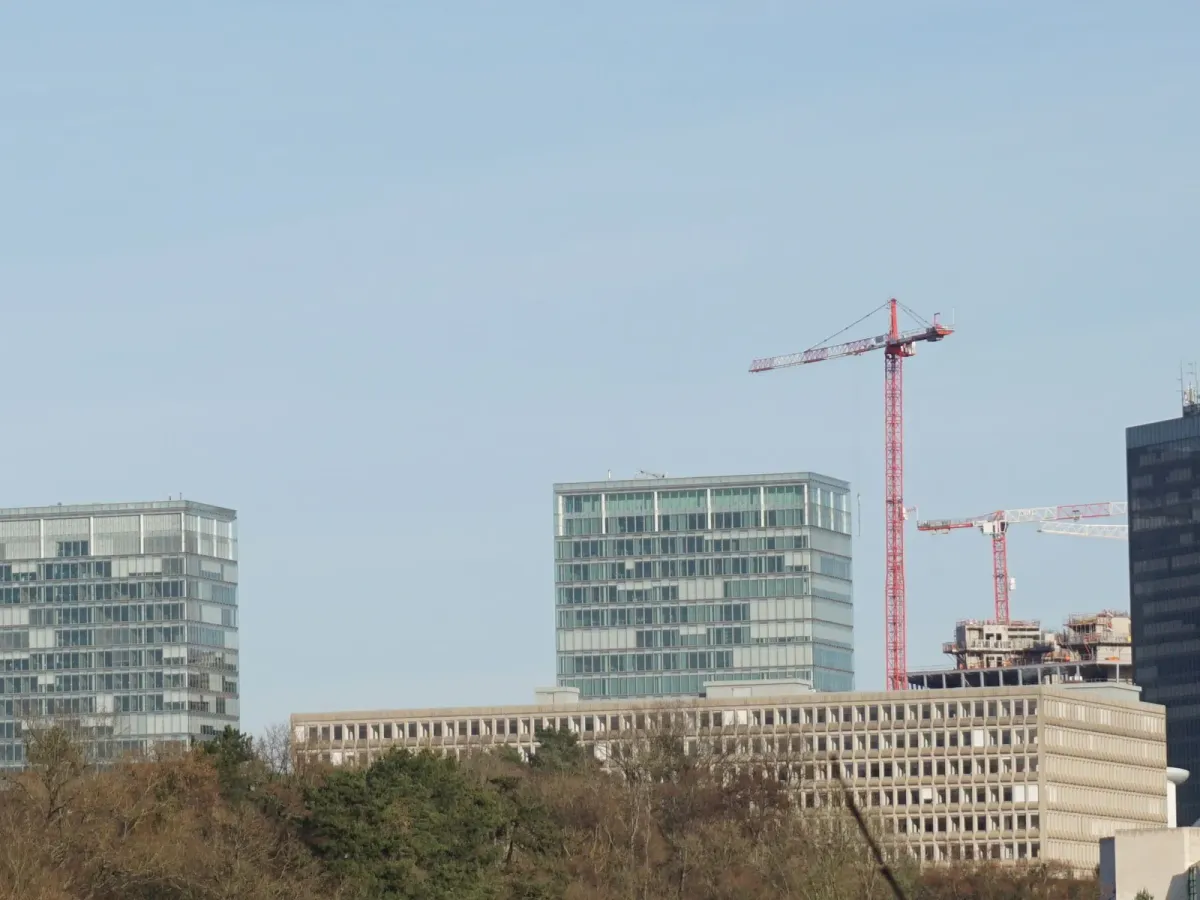 Office towers and construction cranes on the Kirchberg plateau in Luxembourg