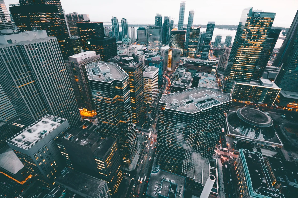Aerial view of a financial district at dusk evoking leveraged Luxembourg group financing structures