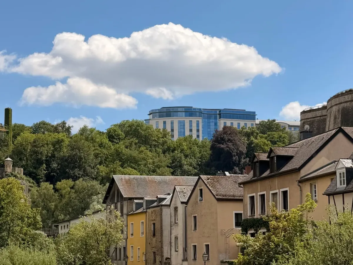 Old houses and gardens below the fortifications of Luxembourg City on a summer day