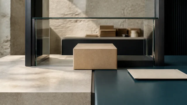 Plain parcel crossing a transparent boundary between two work areas to illustrate a cross-border VAT transaction